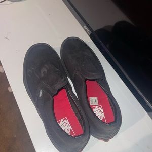 Black on black flame slip on vans